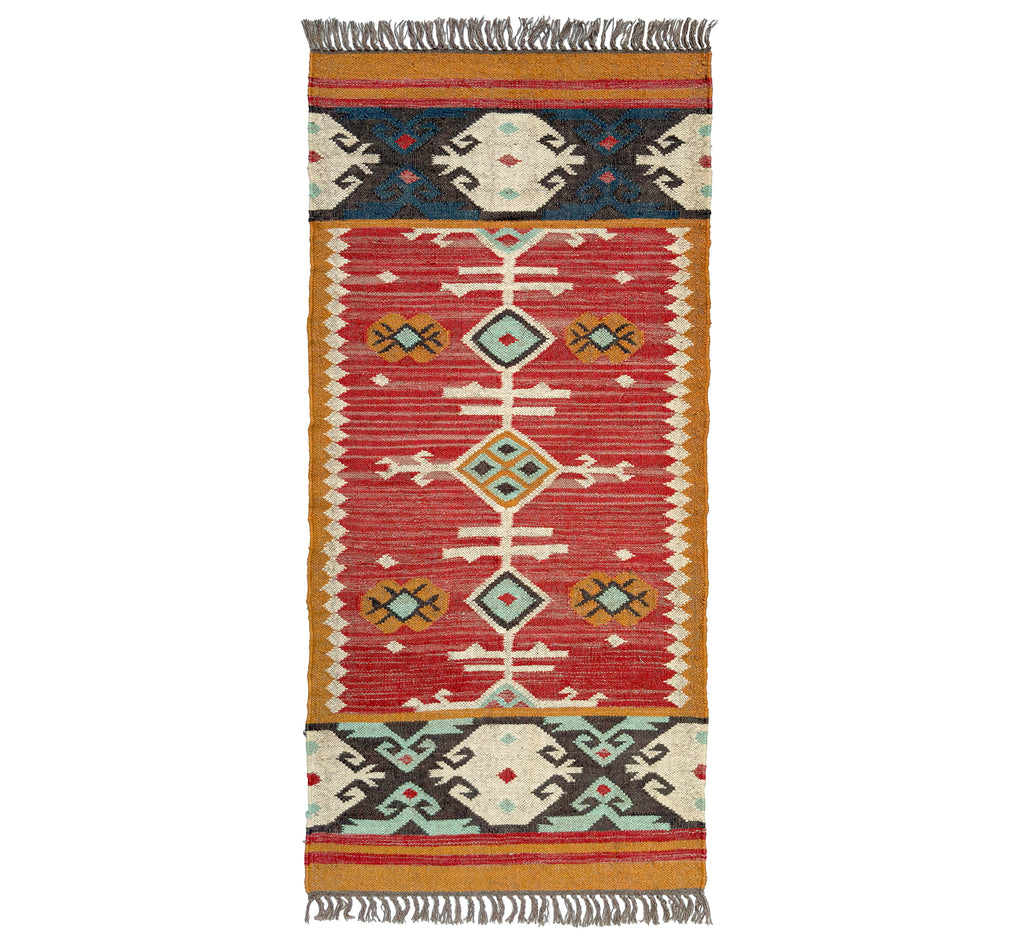 Woven runner kilim rug with geometric pattern on a white background