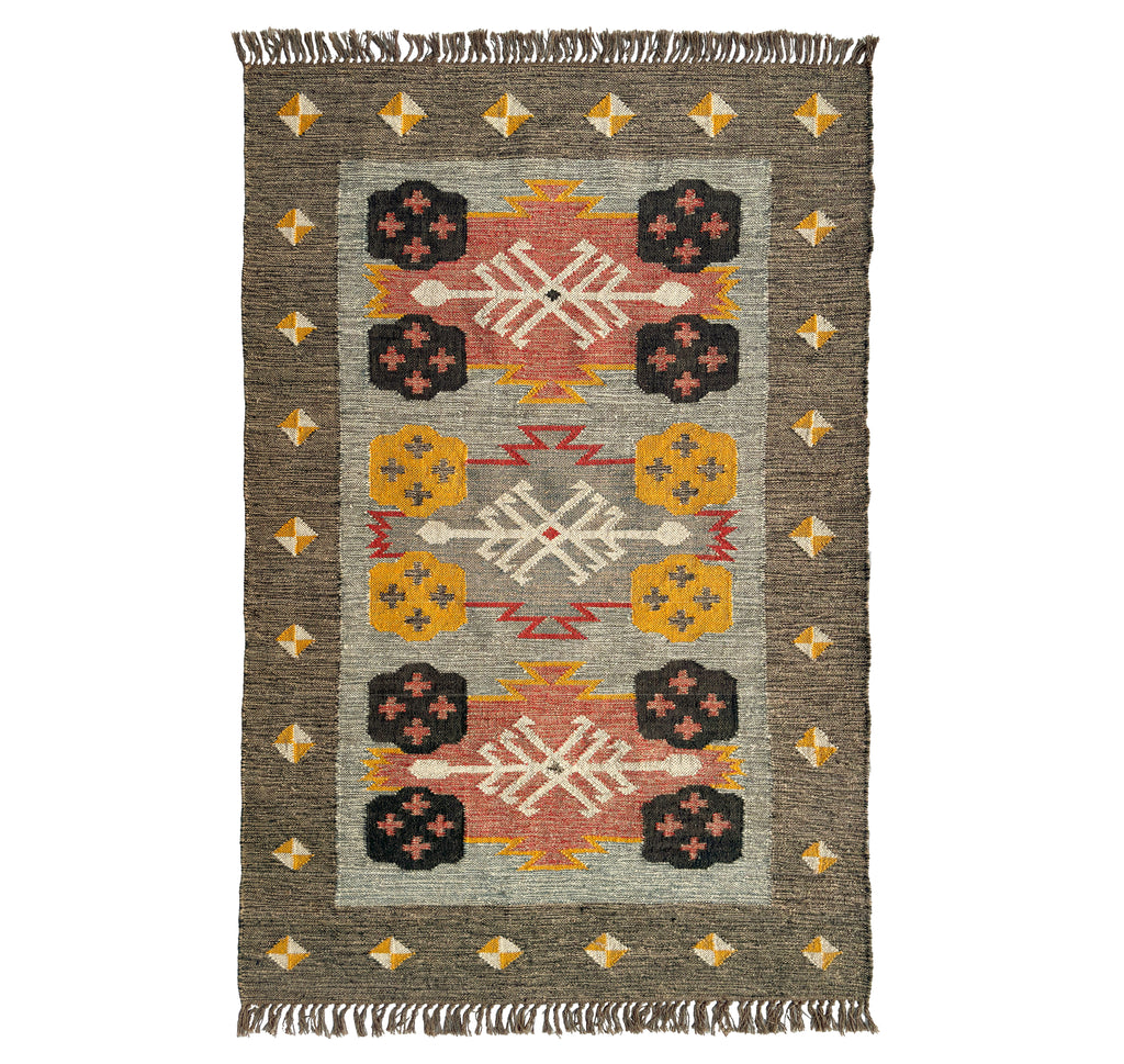 Wool Jute Kilim rug with geometric pattern on a white background
