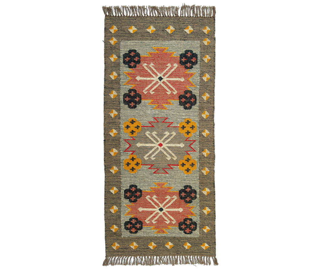 Decorative rug with geometric pattern on a white background