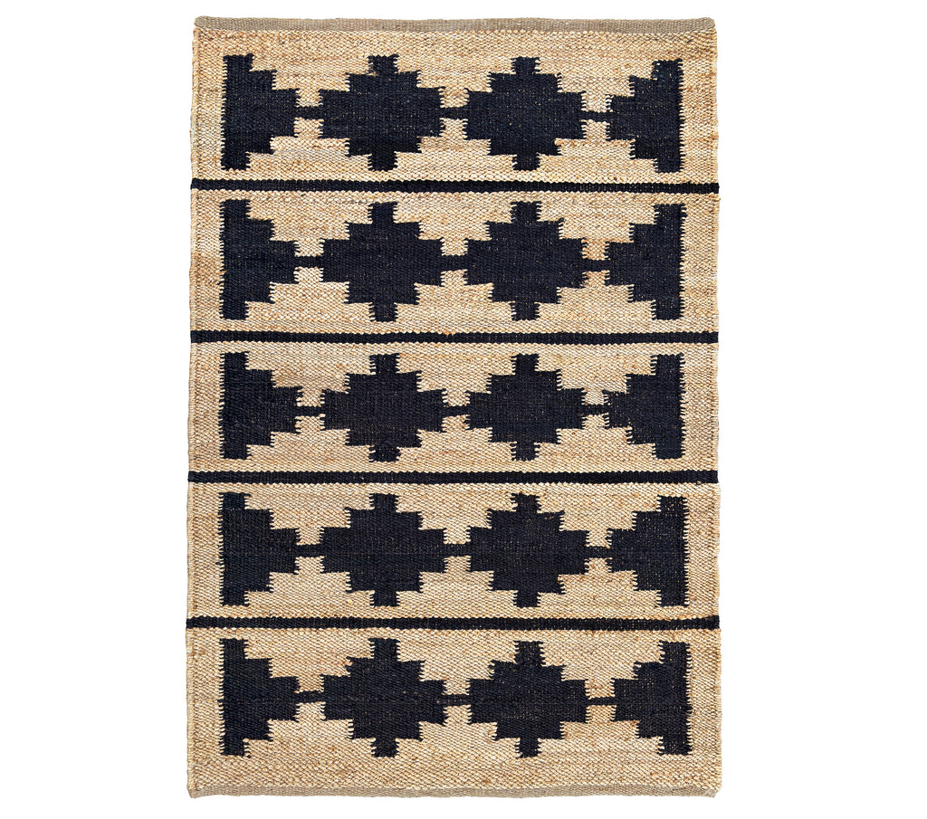 Rug with black geometric pattern on beige background