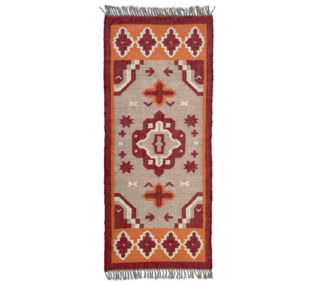 Jute Kilim runner rug with geometric pattern on a white background