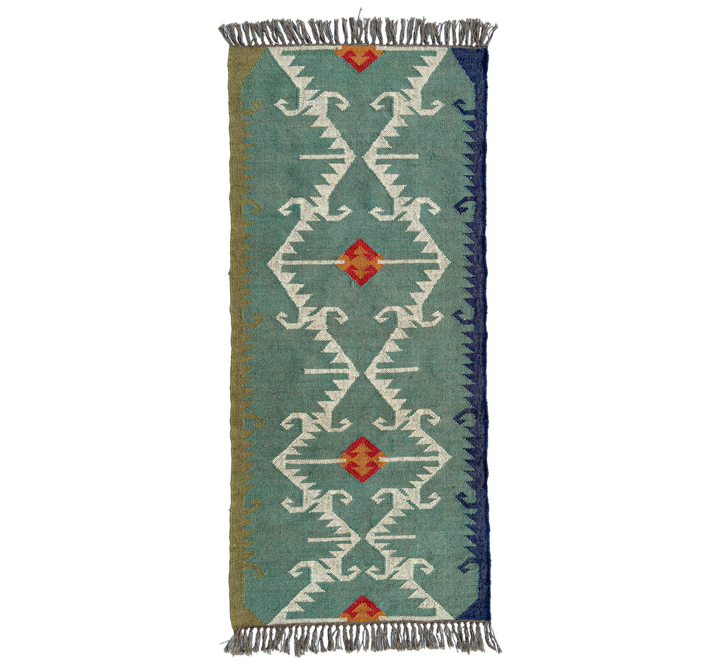 Woven Kilim runner rug with geometric pattern on a white background
